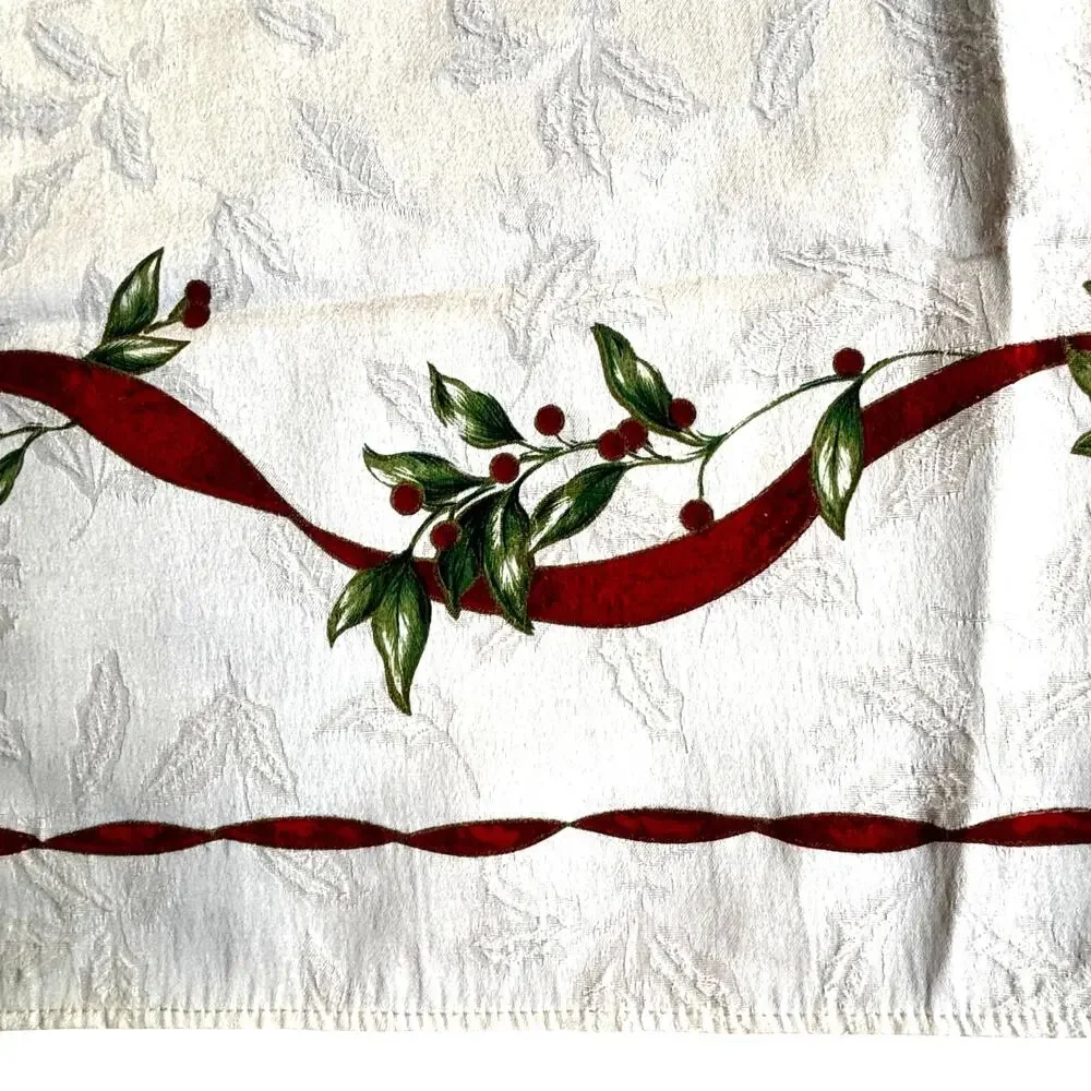 Vintage Christmas tablecloth creamy white brocade red green ribbon holly design